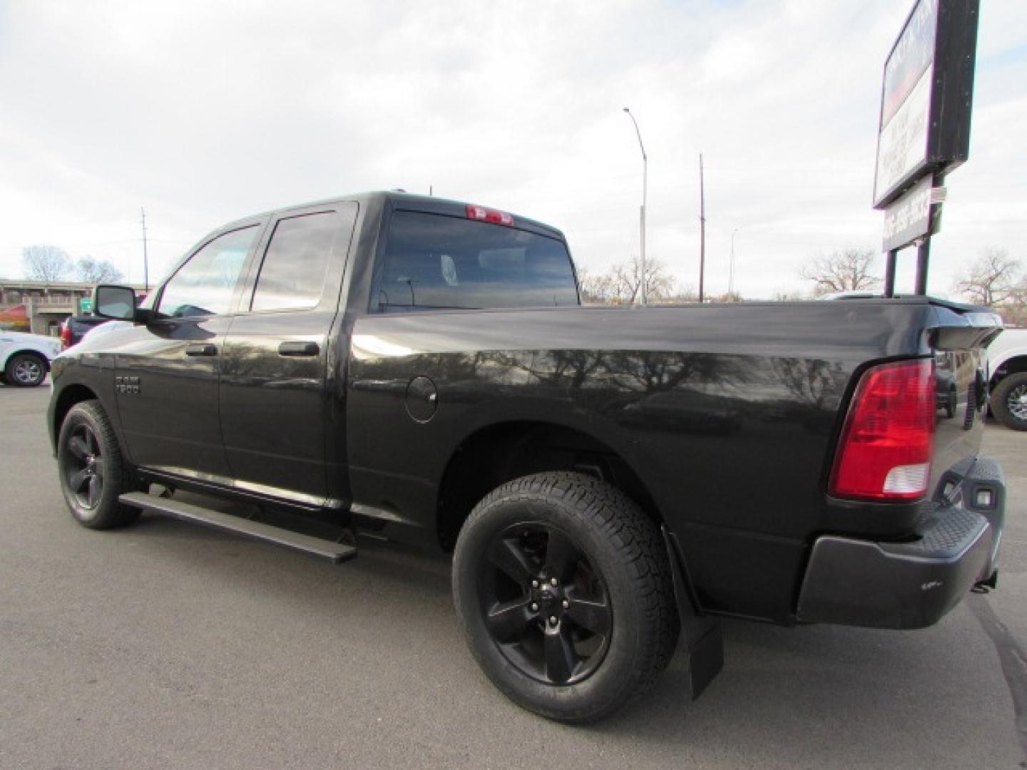 2015 Black /Gray RAM 1500 Express (1C6RR7FG3FS) with an 3.6 24 valve V6 engine engine, 8 speed automatic transmission, located at 4562 State Avenue, Billings, MT, 59101, (406) 896-9833, 45.769516, -108.526772 - 2015 RAM 1500 Express Quad Cab 4WD - Black Express package! 3.6 V6 engine - 8 speed automatic transmission - 4WD - 134,934 miles - Inspected and serviced - copy of the inspection and work performed as well as complete history report provided! Express package - air conditioning - tilt wheel - c - Photo#1